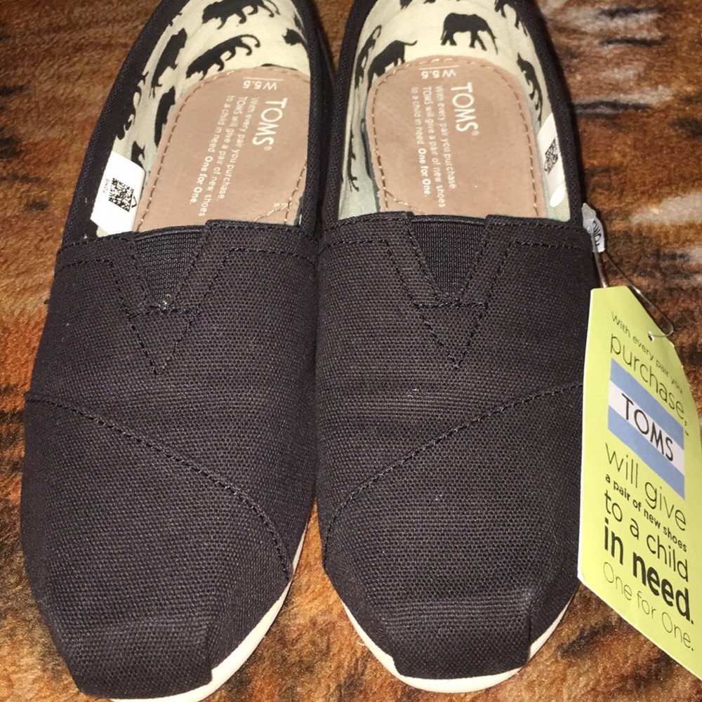 Brand new Toms